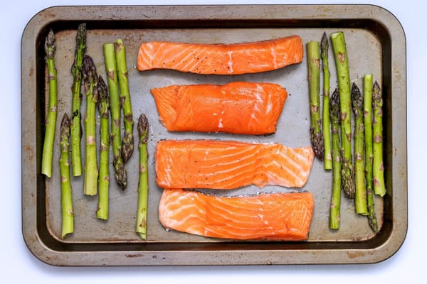 Salmon and asparagus prepped for a nutritious dinner